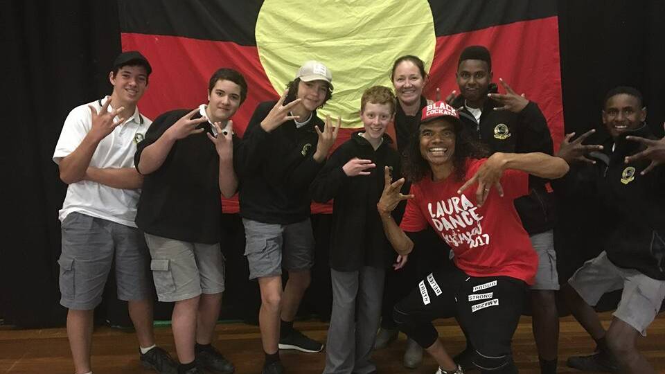 Canowindra High students with nationally recognised performer and comedian Sean Choolburra.