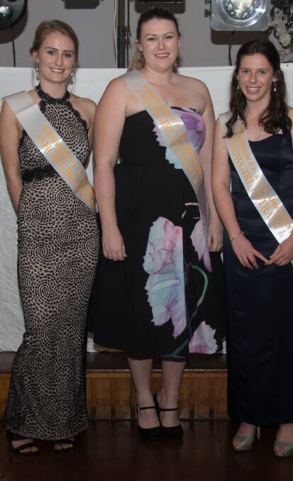 Miss Canowindra Showgirl entrants Philippa Myers, Kate Beath and Meg Austin received their sashes on Saturday.