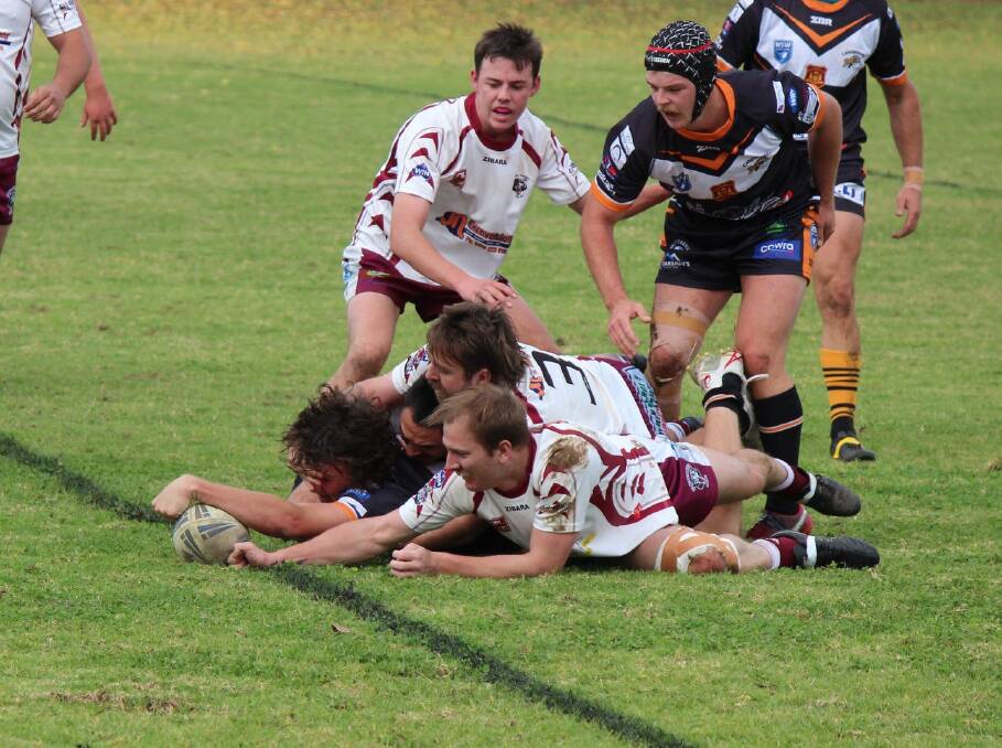 Nathan Barlow reaches out for one of his two four pointers against the Blayney Bears. Photo Narelle Hughes.