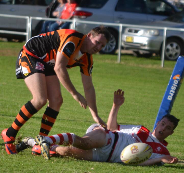 Canowindra winger Mick Mason scored his side's opening try on Saturday at Manildra. The Tigers were unable to defend a 10-0 half-time lead.