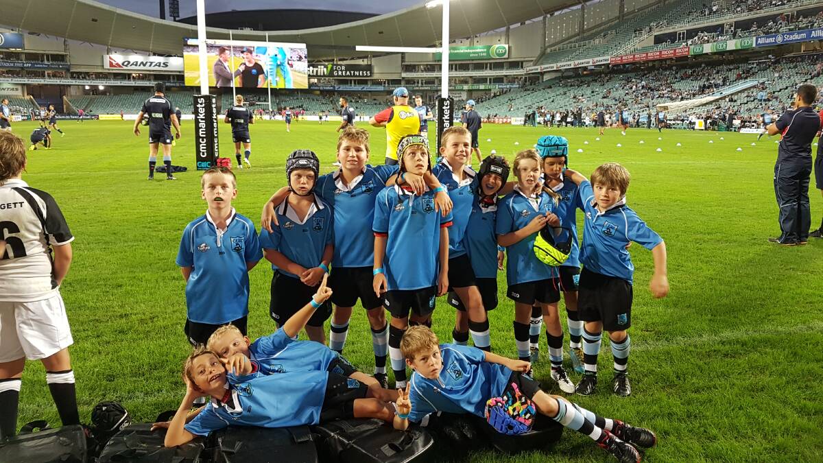 Canowindra junior rugby players pictured at Allianz Stadium on Saturday night.