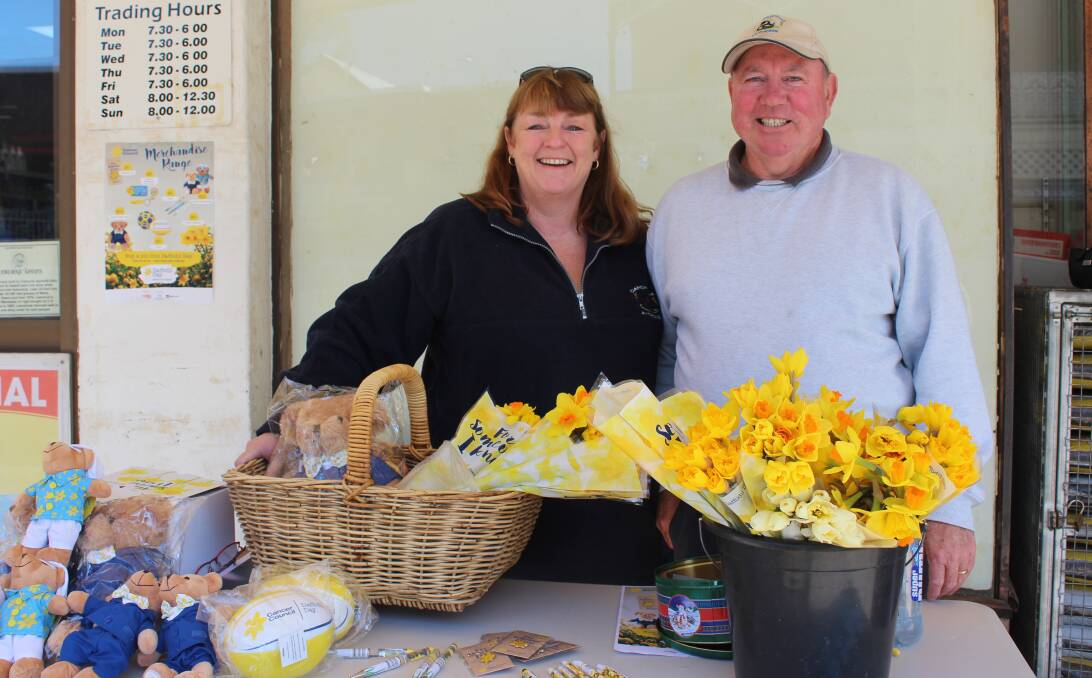 Margaret and Robert Dennis outside of Canowindra IGA with Daffodil Day merchandise. Plenty of locals stopped by to help support one of the Cancer Council's biggest annual fundraisers. 