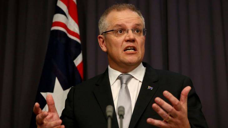 Treasurer Scott Morrison's first budget will include previously ruled-out changes to income tax. Photo: Alex Ellinghausen