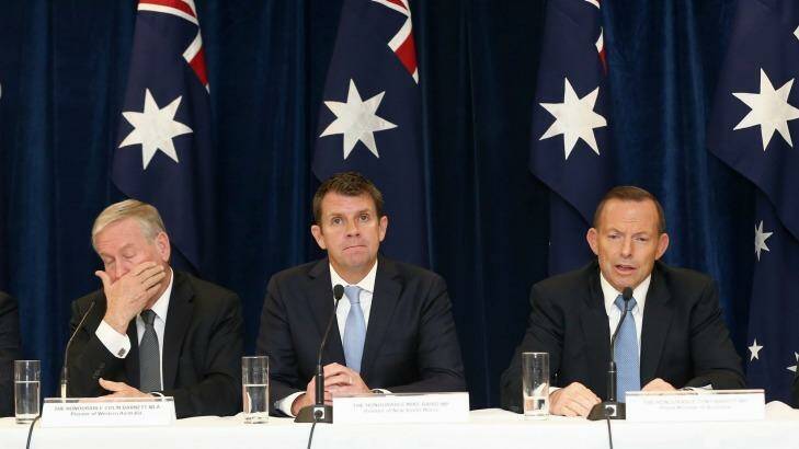 WA Premier Colin Barnett, NSW Premier Mike Baird and Prime Minister Tony Abbott after the COAG meeting at Victoria Barracks in Sydney.  Photo: Alex Ellinghausen