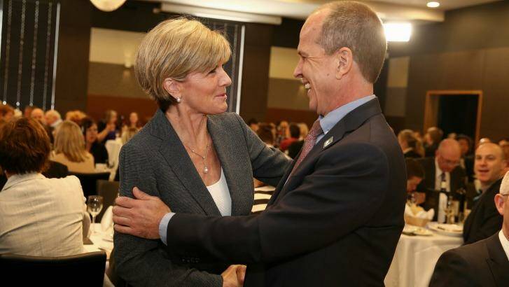 Foreign Affairs Minister Julie Bishop greets journalist Peter Greste ahead of his address at the National Press Club of Australia in Canberra on Thursday. Photo: Alex Ellinghausen