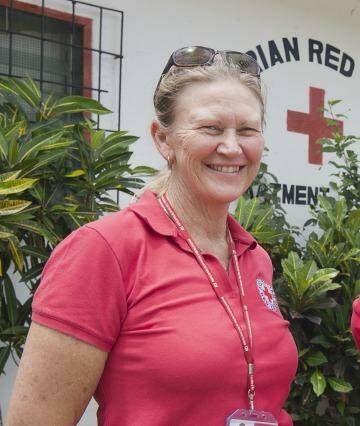 Nurse Libby Bowell with a colleague in Liberia. Photo: Supplied