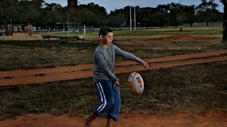 Making a difference: Wilcannia youngster Rashaun Harris-Wilson is one of many who play without football boots. Photo: Brendan Esposito