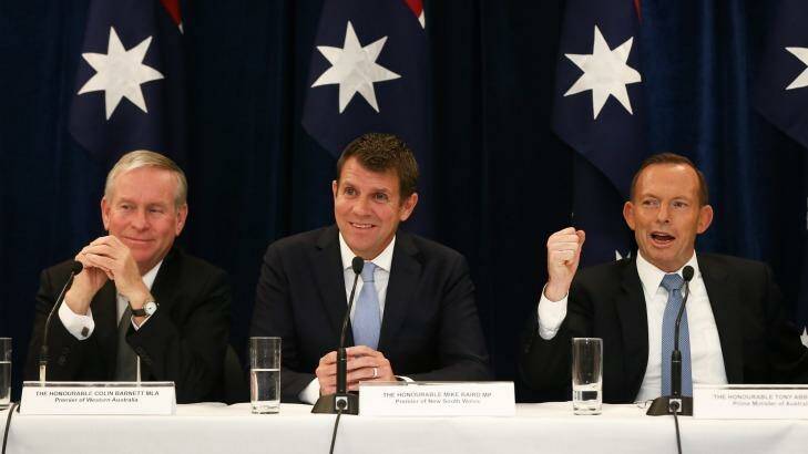 WA Premier Colin Barnett, NSW Premier Mike Baird and Prime Minister Tony Abbott during a joint press conference after the Council of Australian Governments meeting in Sydney. Photo: Alex Ellinghausen