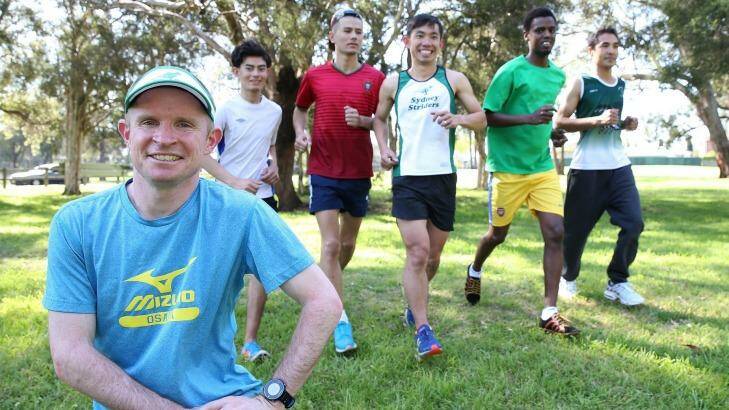 Teachers Keith Hong and David Criniti with the students as they train for their first half-marathon. Photo: Anthony Johnson