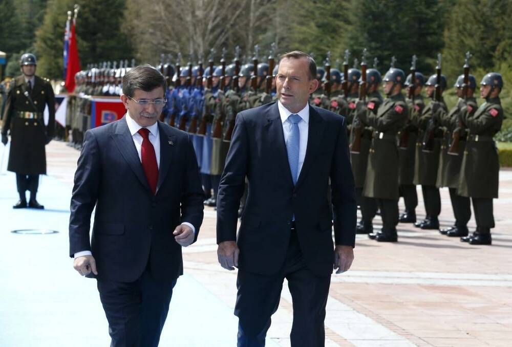 Turkish Prime Minister Ahmet Davutoglu and Australian Prime Minister Tony Abbott at the Cankaya Palace in Ankara. Photo: Supplied