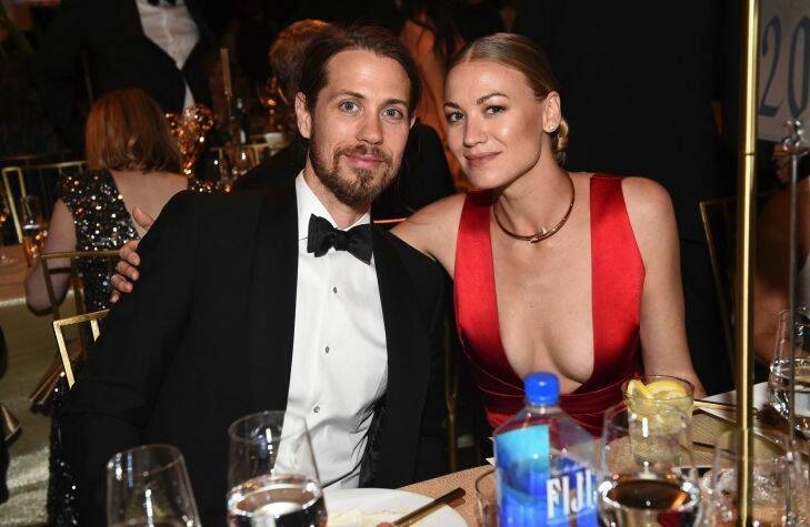 Tim Loden, left and, Yvonne Strahovski attend the Governors Ball for the 69th Primetime Emmy Awards at the Los Angeles Convention Center on Sunday, Sept. 17, 2017, in Los Angeles. (Photo by Al Powers/Invision for the Television Academy/AP Images)