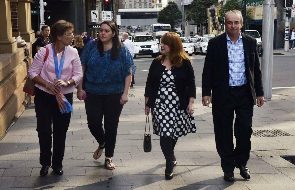 Liz Noble, far left, and Ross Noble, far right, parents of Chris Noble who was killed in an explosion in Rozelle, arrive at the NSW Supreme Court on Thursday. Photo: Nick Moir