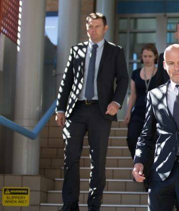 Detectives who arrested Mr Spedding leave Port Macquarie court on Thursday. Photo: Edwina Pickles