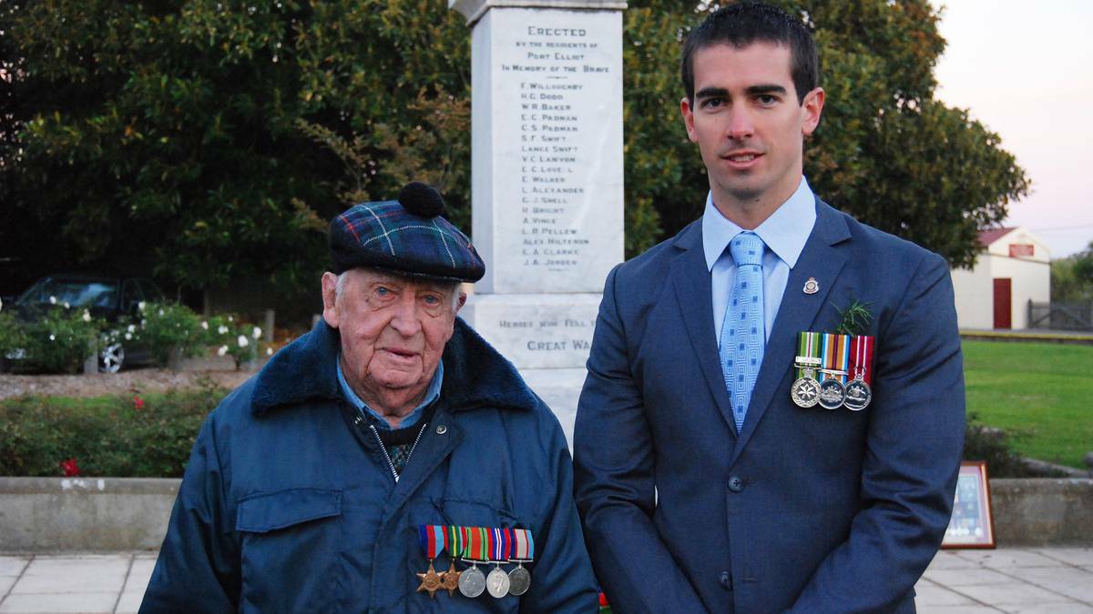 PORT ELLIOTT: World War II veteran Bert Brittain attended the Port Elliot dawn service with grandson and air force officer Andrew Brittain of Canberra. Photo: The Times.
