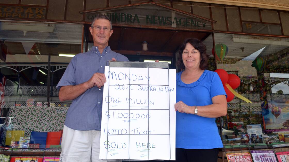 Graham Rice and Linda Guthrie are excited to have sold the winning ticket.