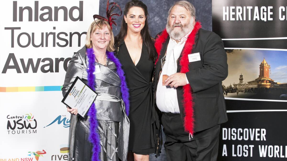 Alison and Graeme Beasley from the Old Vic Inn Historic Guest House accepting their award for Standard Accommodation from Candace Torres, Destination NSW. Photo by Loose Canon Images.