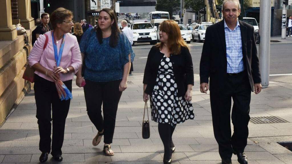 Liz Noble, far left, and Ross Noble, far right, parents of Chris Noble who was killed in an explosion in Rozelle, arrive at the NSW Supreme Court last Thursday, April 16. Photo: Nick Moir