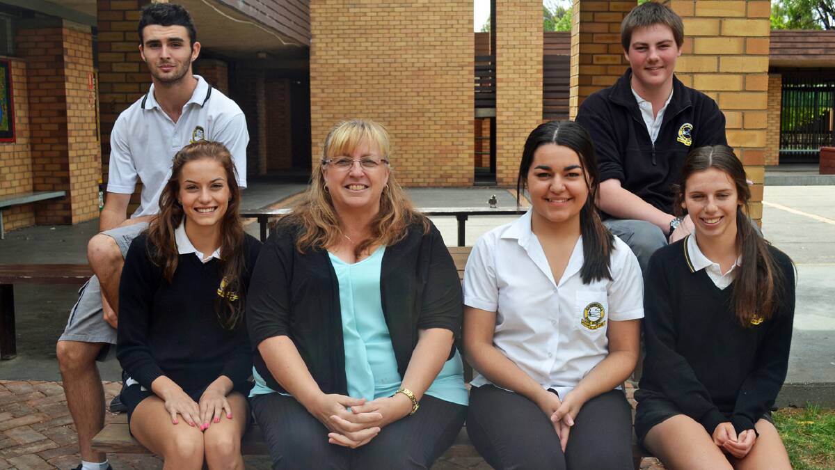 Will Middleton, Ashley Mclean, Madison Spencer, Meg Austin and Aramis Keedle with principal Neryle Smurthwaite (centre) are among the many students at Canowindra High School set to benefit from additional Gonski funding.