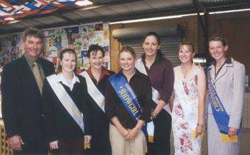 BECOME INVOLVED: Canowindra P A and H Association President Geoffrey Beath with last year’s Miss Canowindra Showgirl entrants Tiffany Baldwin, Alison Morrow, Melanie Watt (2003 winner), Jessica Haertsch, Rebecca Wilton and Katie Sevil (2002 winner). Steward Sue Cartwright urges young women to become involved in this year’s competition.