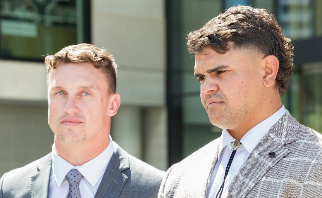 Jack Wighton, left, and Latrell Mitchell outside court on Wednesday. Picture by Sitthixay Ditthavong