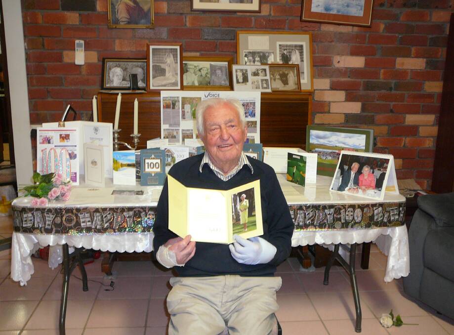 Centenarian Jack Grant with his many congratulation messages.