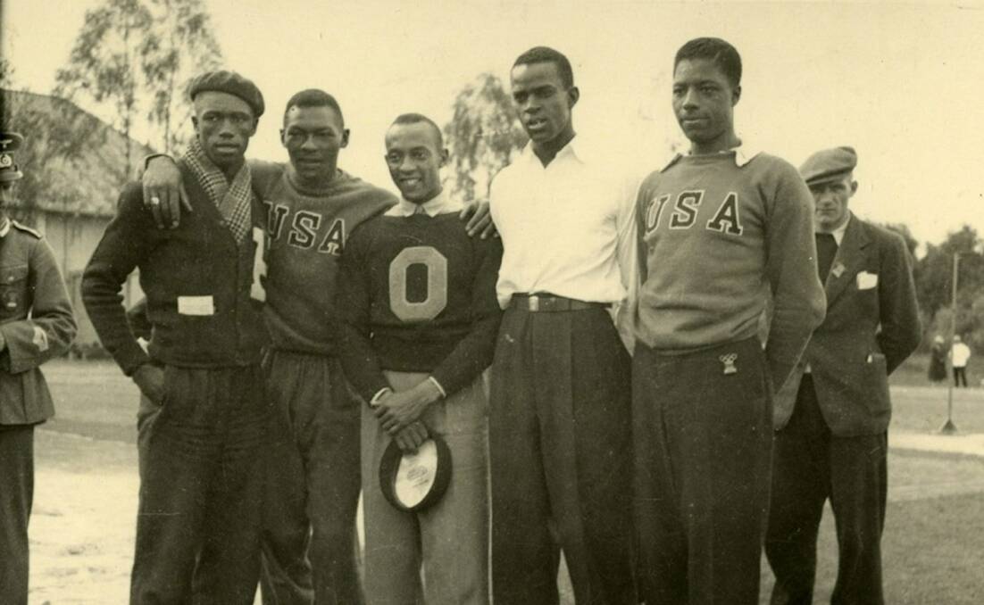 ABOVE: Jesse Owens (centre) with some of his 1936 Olympic team-mates. 