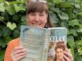 After 10 years of travel, research and writing, Rebecca Wilson holds her Kate Kelly biography in her hands.