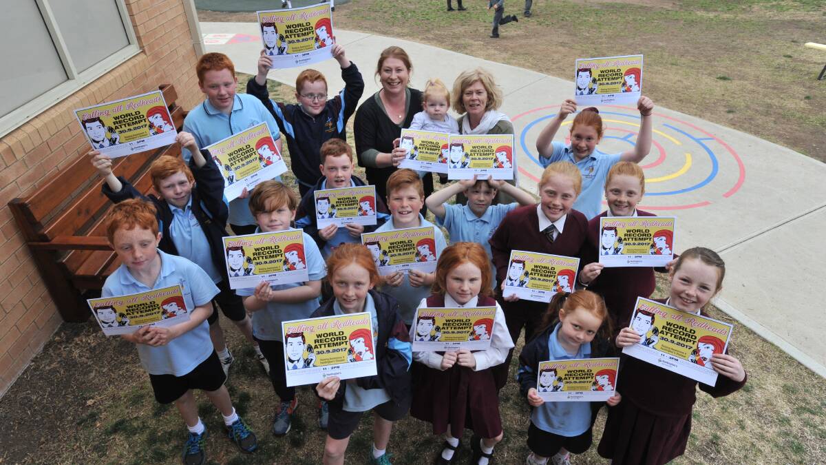 REDDY, SET, GO: Redheads from Catherine MacAuley primary school joined organiser Rachael Brooking and teacher Trish Aumuller to launch the big red day. Photo: JUDE KEOGH 