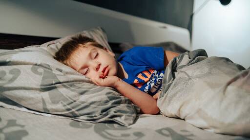 There are some simple steps that can help an active youngster to slip into a peaceful slumber. Photo by Shutterstock
