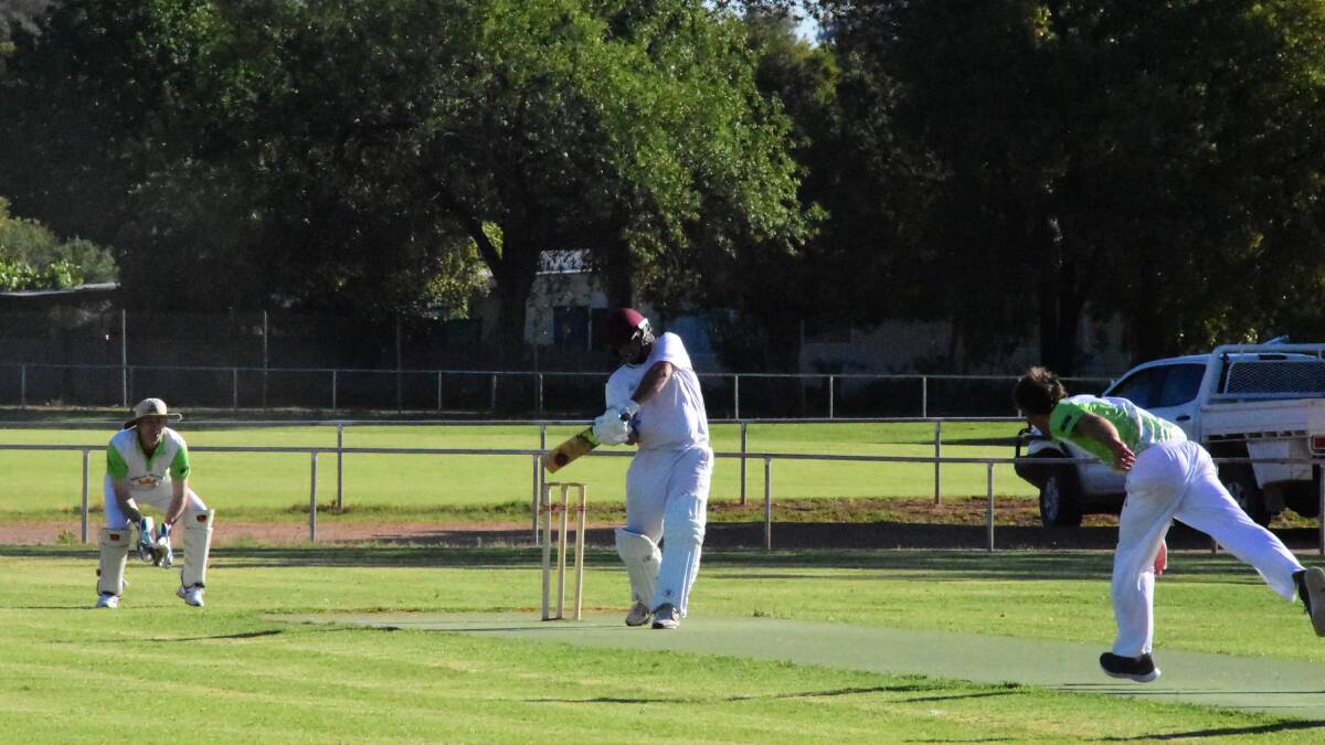 Brendan Traves (52) plays a strong shot during his opening stand with Peter Guthrie as Canowindra loses by 35 runs in the Lachlan Premier League. Photo: Ben Rodin