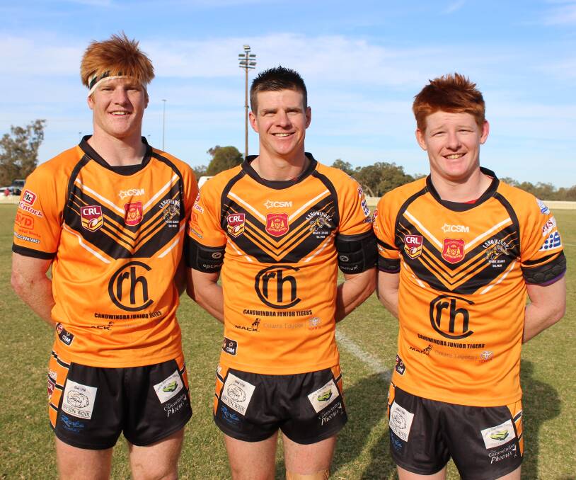 Regan Hughes (left) and his brothers were unstoppable, with Regan scoring five tries in the Tigers' 72-6 win. Photo supplied by the Canowindra Tigers.