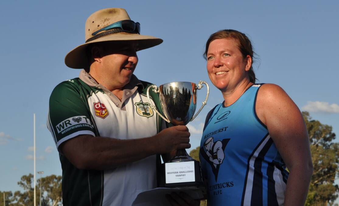 CHAMPS: Carnival organiser Andrew Pull and St Pat's skipper Karah Armstrong at last year's presentation. 