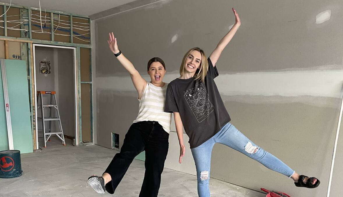 Courtney Booth and Tayla Wasson inside the new Laurie Claire Kids shop which is being re-fitted. Picture supplied