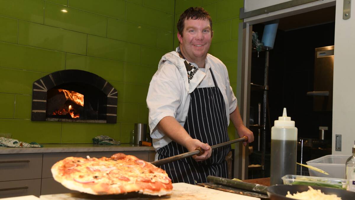 Steve Browning with one of the pizzas at the Philip Shaw pizza night on Friday, February 9, 2023. Picture by Jude Keogh