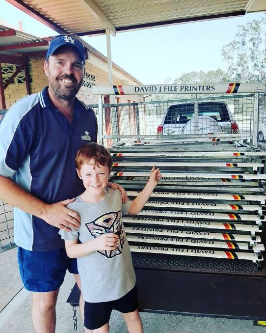 Andrew and Tommy Phelan with the
club's new hurdles donated by
Riverstone Little Athletics.