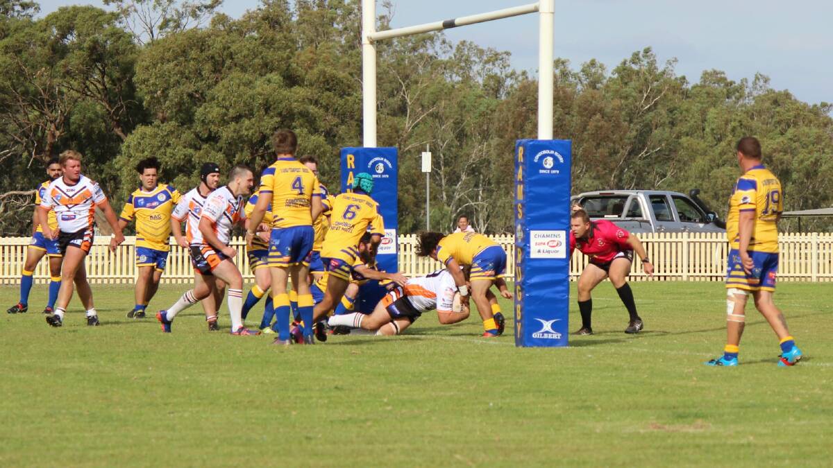 The Tigers crash over for one of their many tries against the Condobolin Rams last weekend.