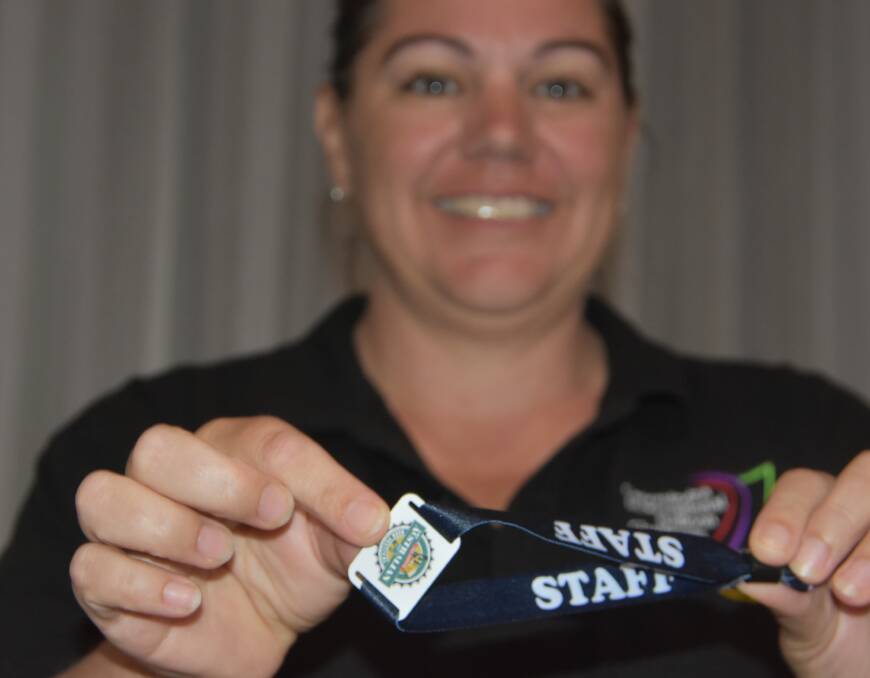 Canowindra Challenge Incorporated treasurer Kim McKenzie with a RFID tag.