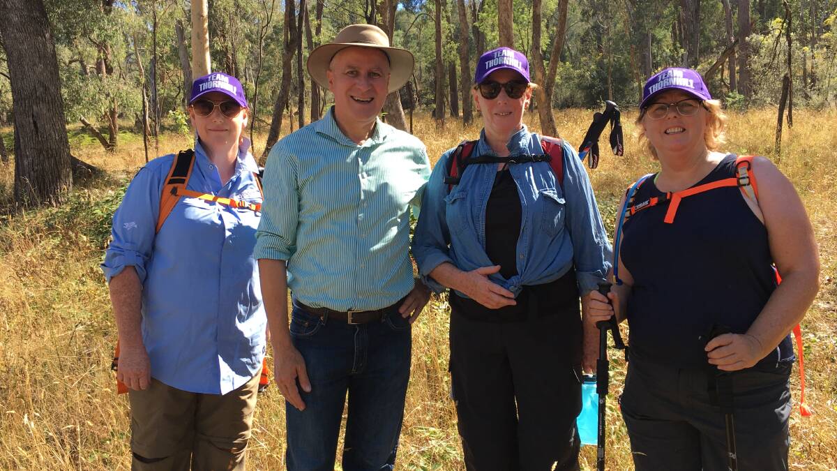 WALKING: The Thornhill sisters Belinda Wright, Marcia Lang and Kate Power with Michael McCormack at Tumbatrek in February. Photo: SUPPLIED. 