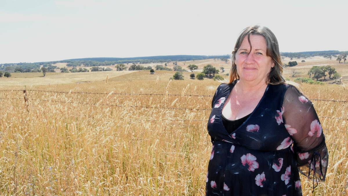 Lisa Paton pictured in 2021 in front of an area that contains Aboriginal sites and will be covered by the tailings dam if the mine goes ahead. File picture