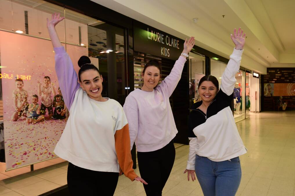 Tayla Wasson, Danielle Turner and Courtney Booth are excited to open Laurie Claire Kids in the Orange City Centre. Picture by Jude Keogh.