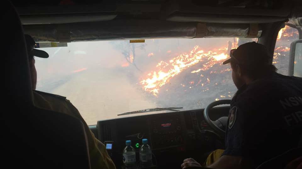 OVERWHELMED: Wytaliba RFS brigade did its best to battle last year's devastating Kangawalla fire, and saved many houses and lives. But most of the community burned to the ground. Photo: Wytaliba RFS