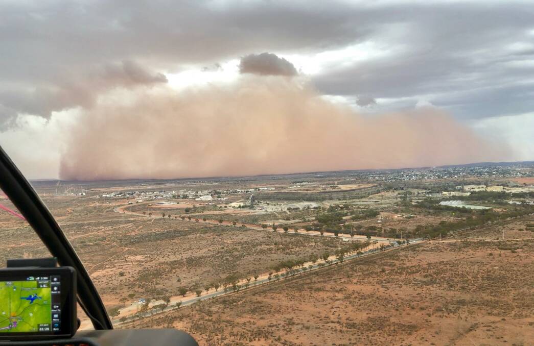 The dust storm descends right on Broken Hill. Photo by Jamie Henderson of Stock and Station Aviation.