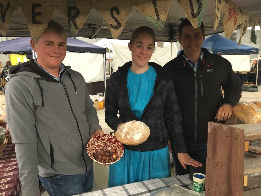 BAKE SALE: Marshall Eberly, Wendy and Lyndell Diller are part of the family that sells baked goods at the farmers market. Photo: ALEX CROWE
