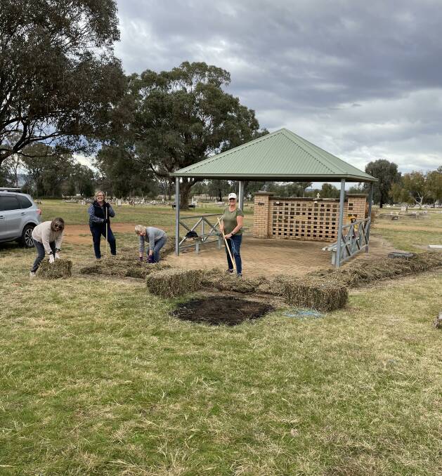 Members of the Canowindra Garden Club at a recent working bee at Canowindra Cemetery. 
