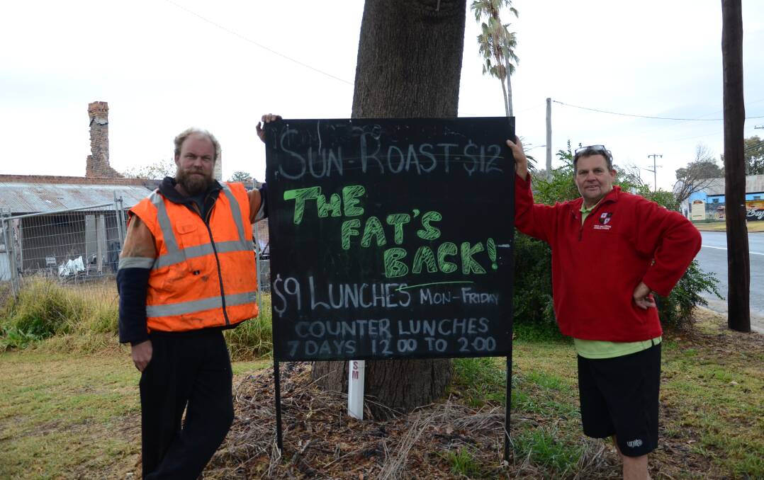COMING SOON: New co-owners Ben Mulley and Gordon Hurry have announced "The Fat's Back" on the original Fat Lamb sign, which still maintains details of the pub food it sold prior to the venue burning down in October 2012.