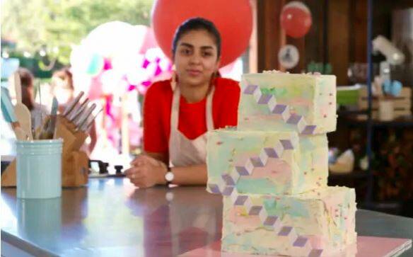 Winner: Great Australian Bake Off winner Sunny Nasir Ahmad and her geometric layer cake. Photo Foxtel