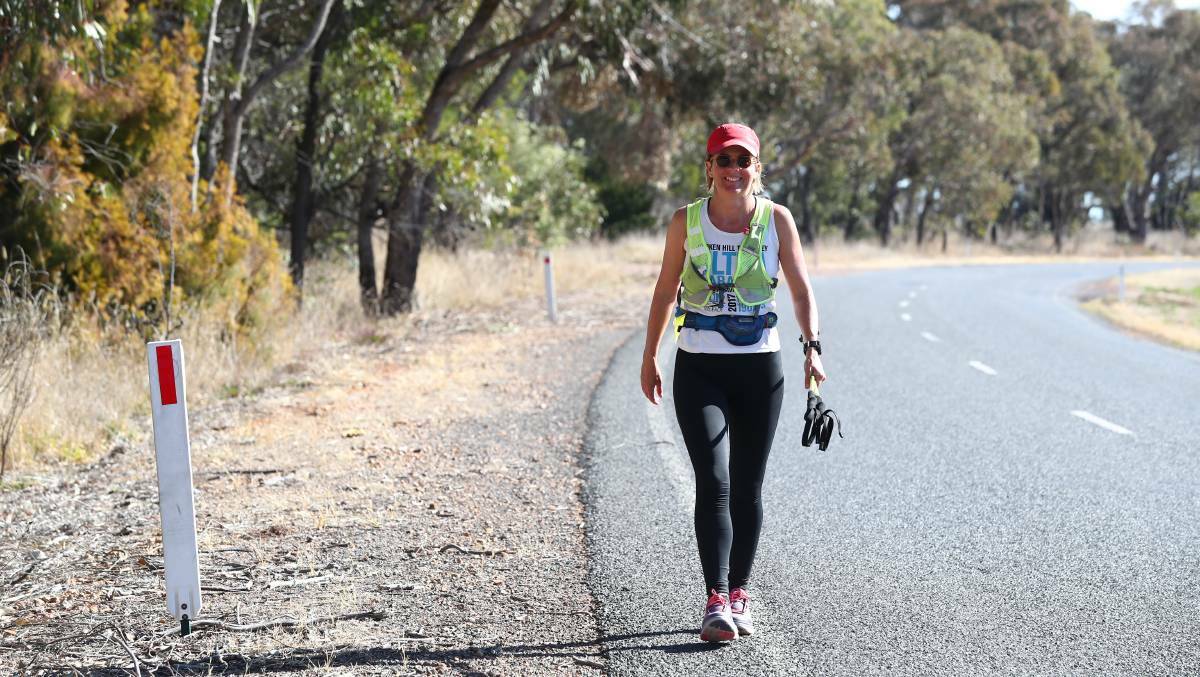 RUN AGAINST VIOLENCE: Kirrily Dear travelled from Forbes via Canowindra to Orange and onward to Bathurst and Oberon via Blayney. Photo: PHIL BLATCH 0911pbwalk3