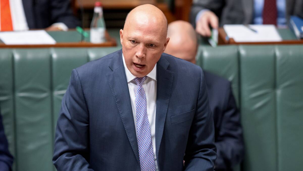 Defence Minister Peter Dutton says troops should not be "distracted" by war crimes in the past. Picture: Sitthixay Ditthavong