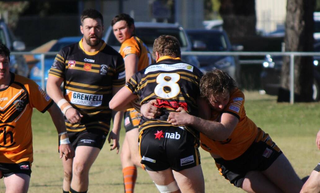 Nick Willson brings down a Grenfell player during Sunday's win at Tom Clyburn Oval.