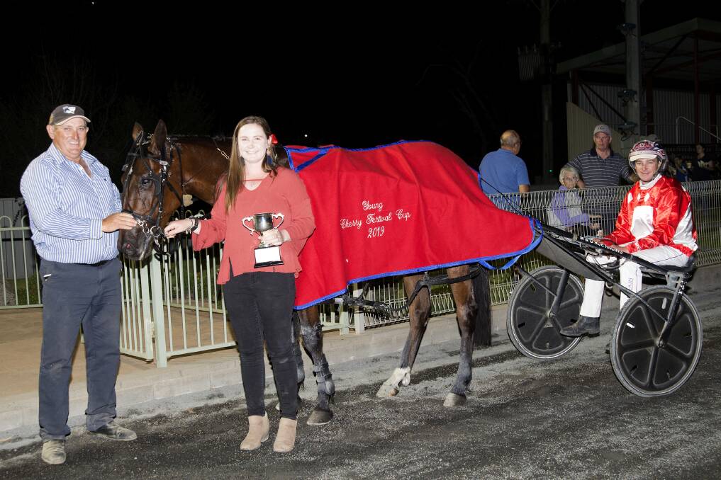 Mat Rue in the gig with Ziggy Rocks and winning connections with president of the Young Harness Racing Club David Micallef. Photo - Martin Langfield